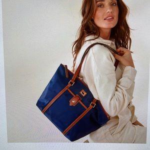 One outside pocket.  Three inside pockets.  One inside zip pocket